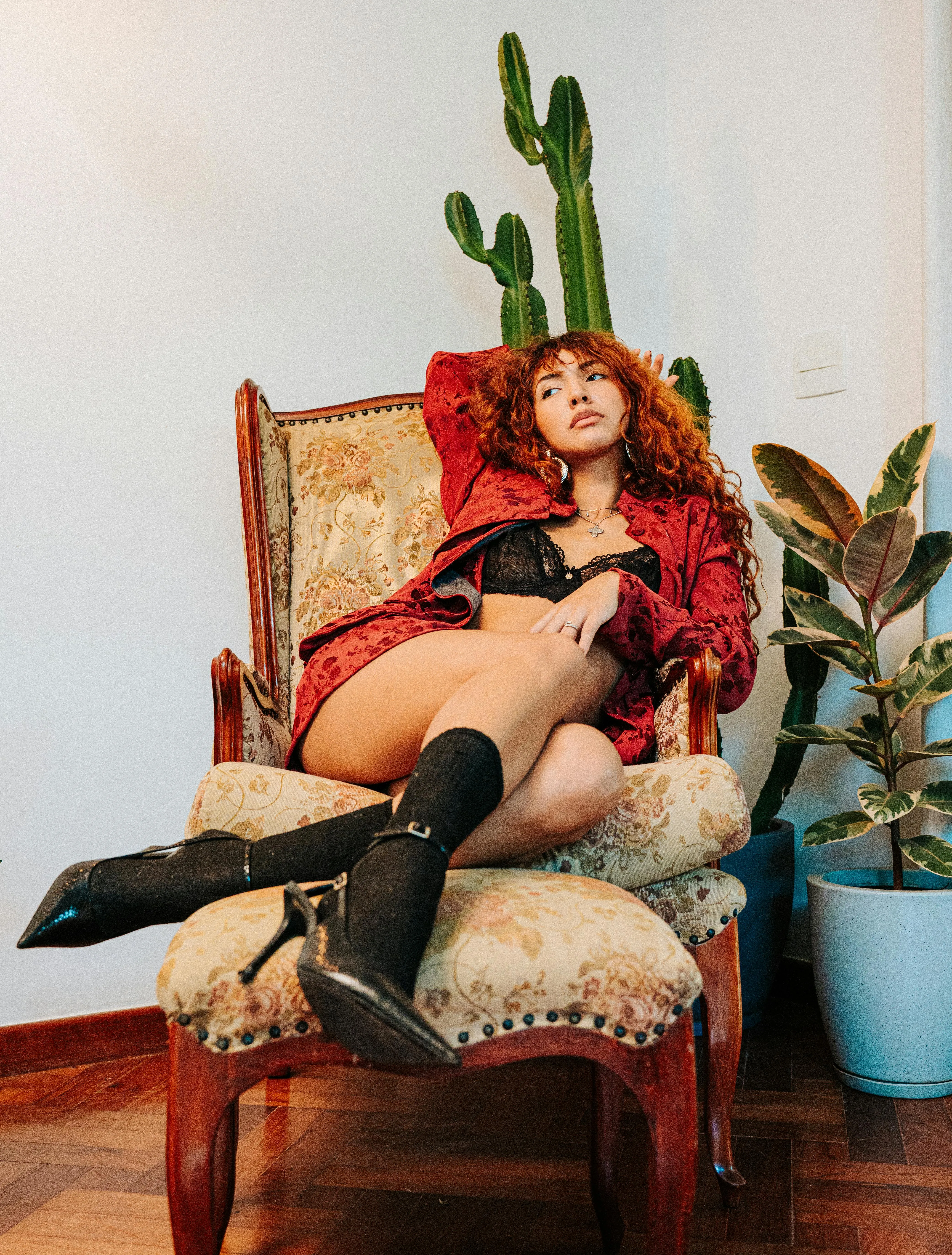 A woman reclines in a cushioned chair, the question of whether you are actually paying yourself consistently