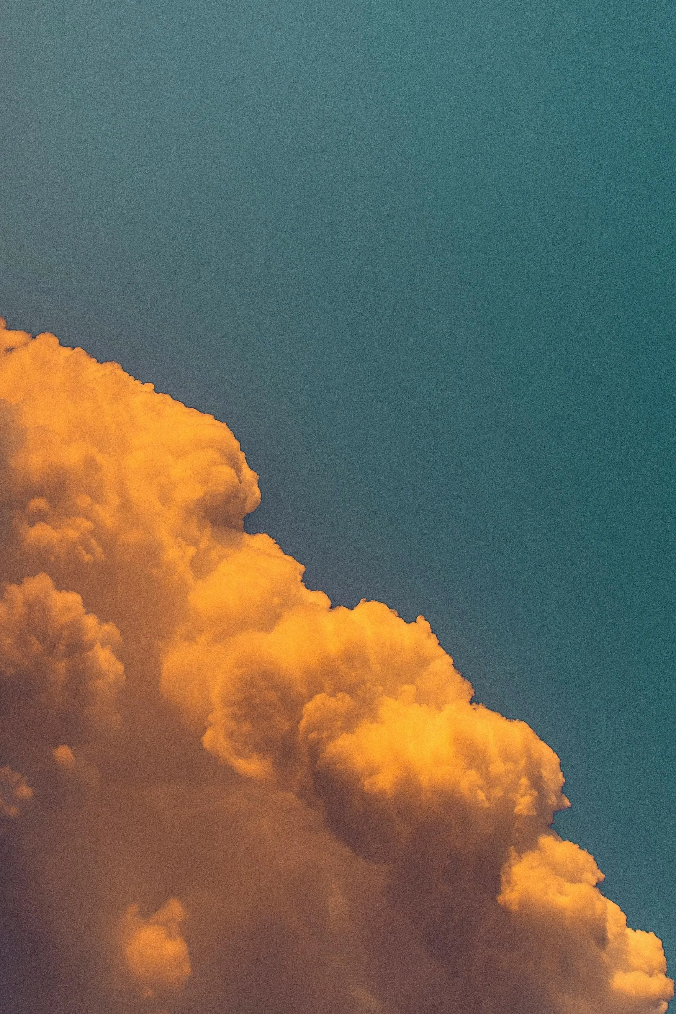 A bright orange cloud, what you picture when you hear Cloudflare